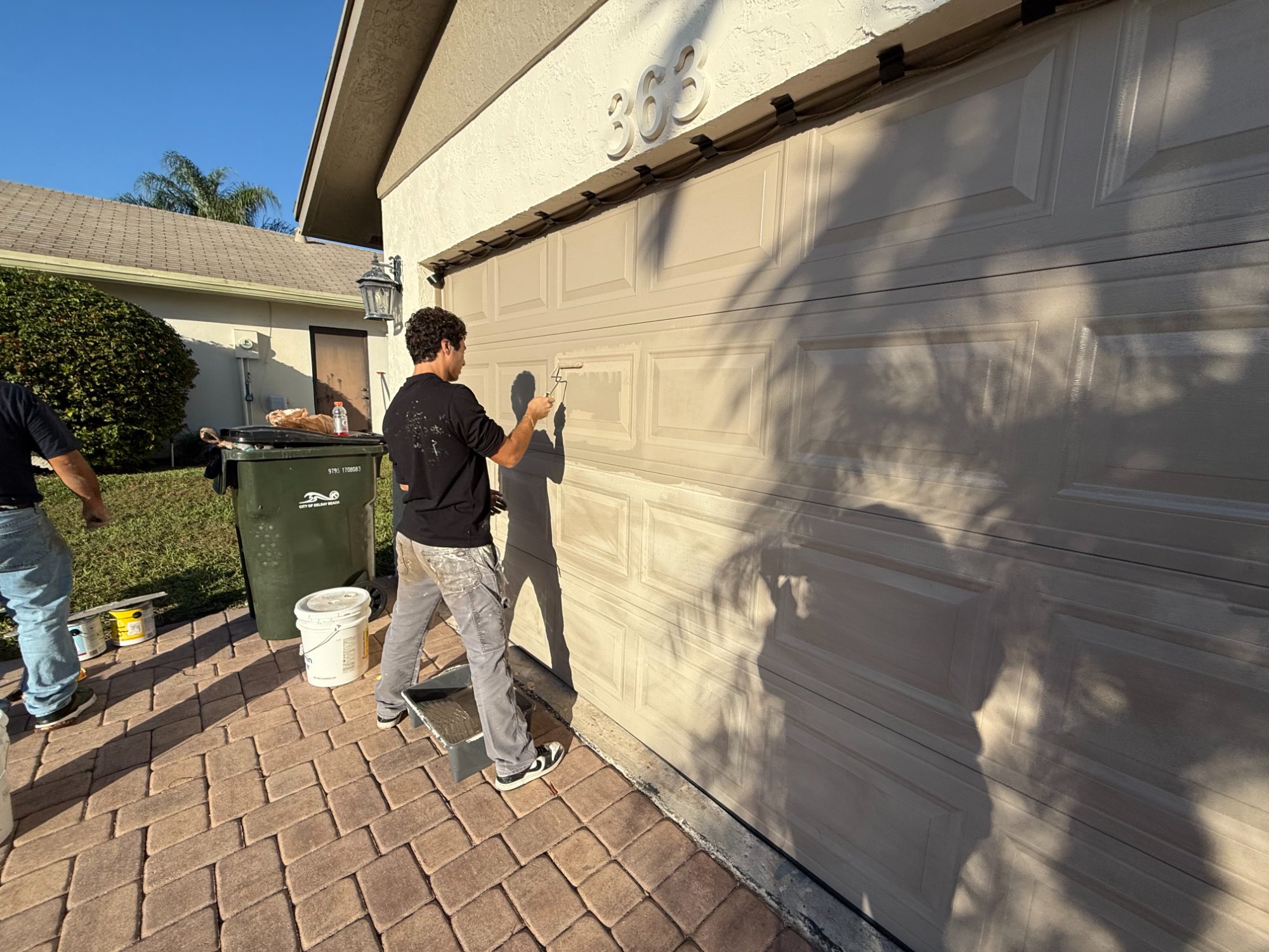 Painting garage door with roller